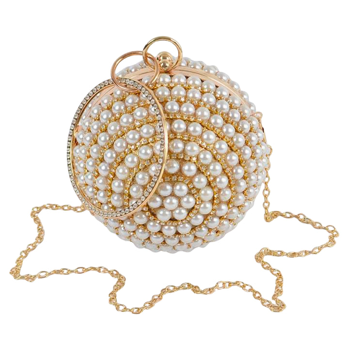 A round, pearl-embellished evening clutch bag with a gold-tone chain strap and ring detail, shown on a plain white background.