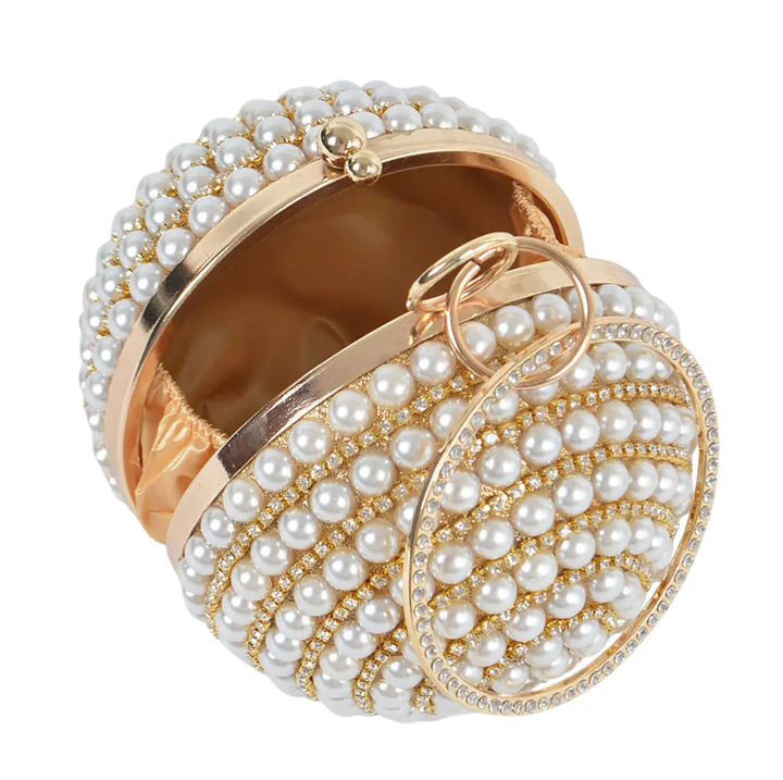 A round clutch purse decorated with rows of white faux pearls and gold-tone metal trim, shown open on a plain white background.